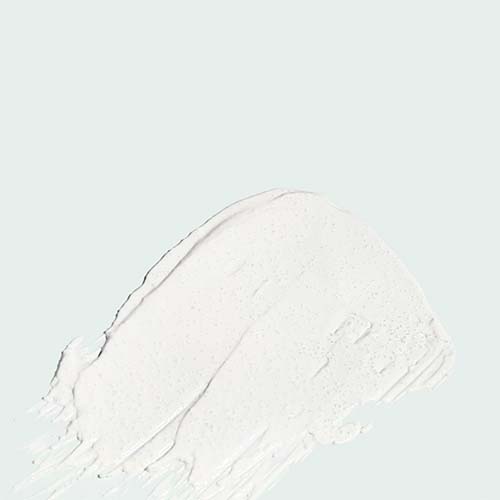 Een witte laag van het Ageless Resurfacing Masque met fijne korreltjes voor exfoliatie.