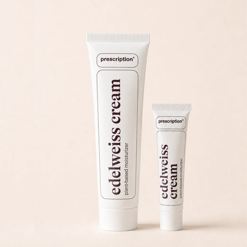 Twee witte tubes Prescription edelweiss cream plant based moisturizer in verschillende formaten naast elkaar op een lichte achtergrond