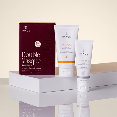 Sfeerfoto van de IMAGE Skincare Double Masque Routine set gepresenteerd op een wit podium