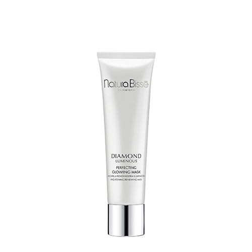 Een witte tube Natura Bissé Diamond Luminous Perfecting Glowing Mask met zwarte tekst.