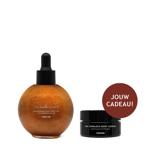 Een ronde glazen flacon van Cenzaa The Glow Elixir glinsterende olie voor gezicht en lichaam, met daarnaast een gratis Be Fabulous Body Scrub cadeau.