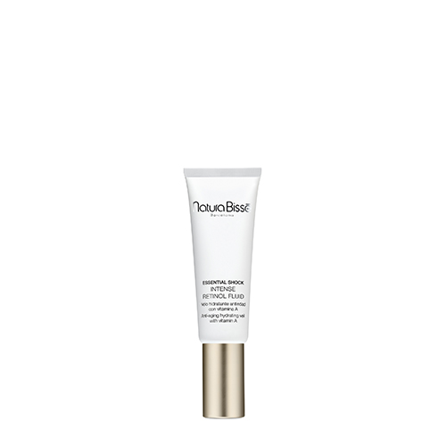 De productverpakking van Natura Bisse Essential Shock Intense Retinol Fluid, een slanke witte tube met een goudkleurige dop.