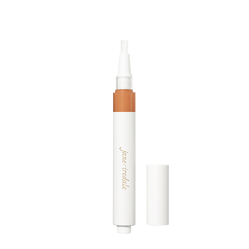 De geopende jane iredale Skintuition Under Eye Concealer MD9 met de dop ernaast en een penseeltje aan de bovenkant