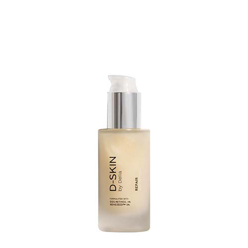 Een glazen flacon van het merk D SKIN met een pompje, gevuld met Repair Nutrition serum en een inhoud van 50ml, staand tegen een witte achtergrond.