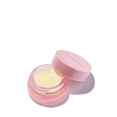 Een open roze potje HydroPeptide LipLock Hydrator met een subtiele gele balsem