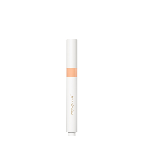 Gesloten witte huls van jane iredale Skintuition Brightening Under Eye Concealer in de kleur LM5 met perzikkleurig doorkijkvenster