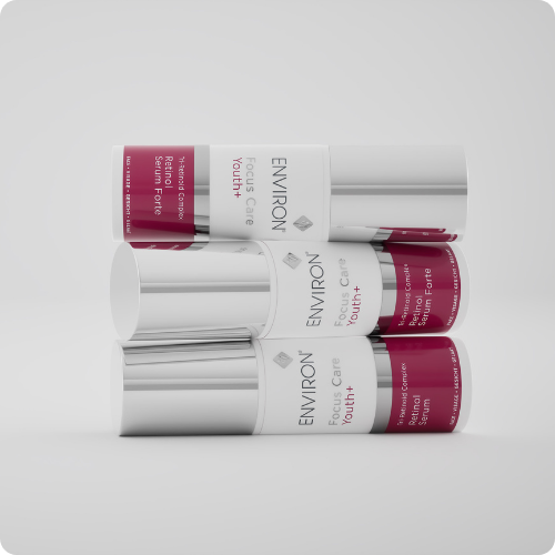 Drie liggende, gestapelde flacons van de Environ Focus Care Youth+ Retinol Serums tegen een lichtgrijze achtergrond. de afbeelding heeft ronde hoeken