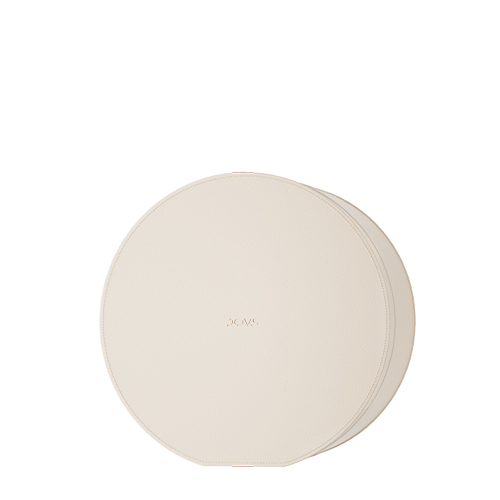 Een minimalistische ronde en crème-witte luxe opbergdoos met het JOVS logo subtiel in het midden gedrukt