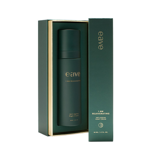 Een geopende luxe groene geschenkdoos met gouden binnenrand waarin de EAVE Anti-Ageing Night Cream stevig gepresenteerd wordt.