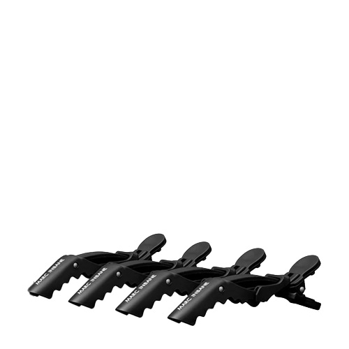Vier zwarte professionele Marc Inbane Croc Clips met kartelrand voor het verdelen van het haar.