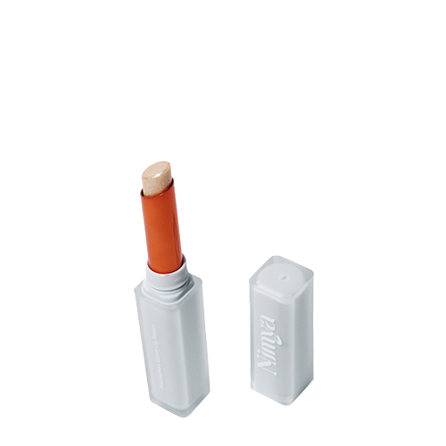 Open witte huls van de Nimya Dressed In Diamonds glitter lippenstift met de bijbehorende dop ernaast op een witte achtergrond