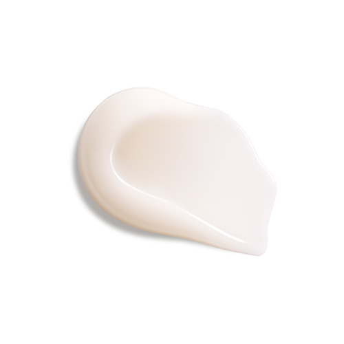 Een gladde veeg van de zijdezachte, wit-beige vloeibare textuur van het Diamond Extreme Serum op een witte achtergrond.