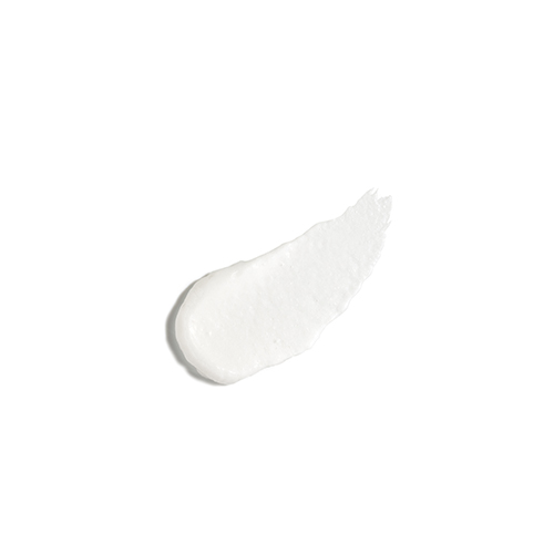 Een swatch van de romige, witte emulsie-textuur van de Natura Bissé Tolerance Cleanser op een witte achtergrond.