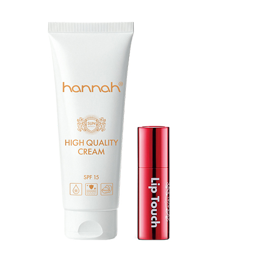 Een witte tube hannah High Quality Cream SPF15 gezichtsverzorging gepresenteerd naast een rode hannah Lip Touch huls.
