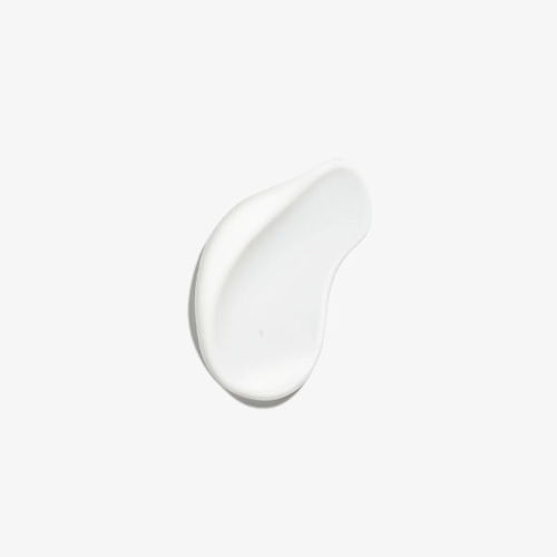 Een productswatch van de rijke, witte crème-textuur van de Natura Bissé Smooth Conditioner op een witte achtergrond.