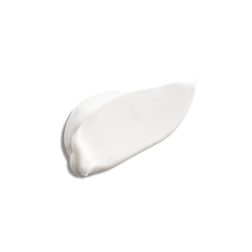 Een volle, romige en rijke witte crème textuur van de Natura Bissé Diamond Extreme Rich Texture op een witte achtergrond.