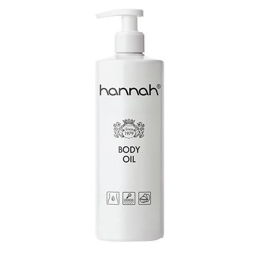 grote witte fles met body oil van hannah met pompje op witte achtergrond