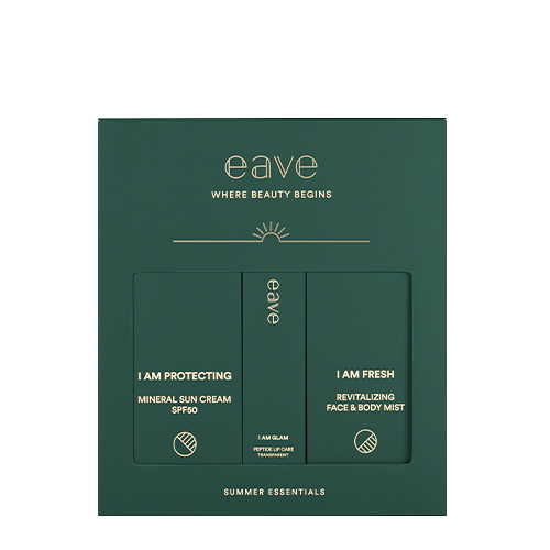Een gesloten, donkergroene EAVE SUMMER ESSENTIALS BOX verpakking met goudkleurige belettering tegen een witte achtergrond.