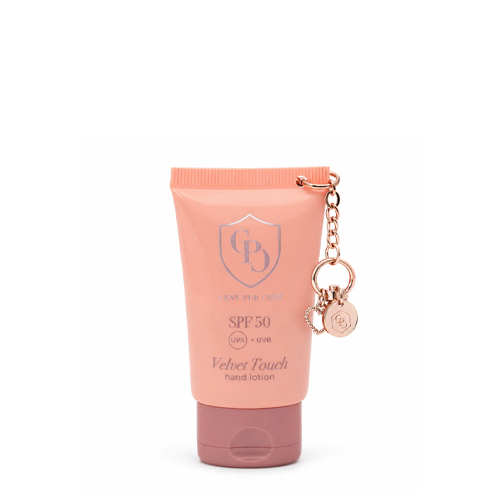 Een tube Cent Pur Cent Velvet Touch handlotion met SPF 50 bescherming, 20ml verpakking.