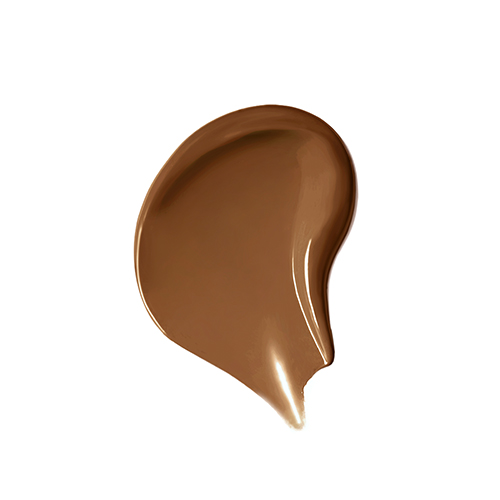 Vloeibare textuur van de Jane Iredale Skintuition in de tint 60 Dark op een strakke witte achtergrond.