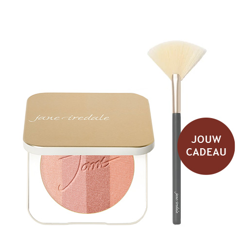 Jane Iredale PureBronze compact in de kleur Peaches and Cream naast een waaierkwast.