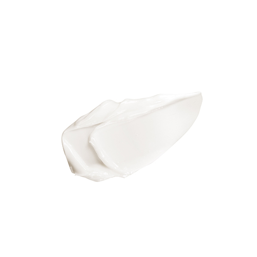 Een close-up van de rijke, witte textuur van de Natura Bissé Essential Shock Intense Double Action Cream op een witte ondergrond.