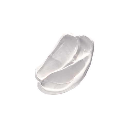 Een witte, romige textuur van het Natura Bisse Essential Shock Intense Masker, weergegeven als een artistieke veeg op een witte achtergrond.