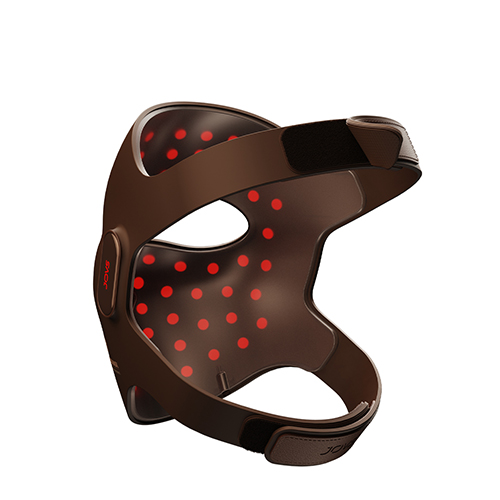 De achterkant van het bruine JOVS laser gezichtsmasker met klittenbandsluitingen en zichtbare rode lichttherapie punten aan de binnenkant