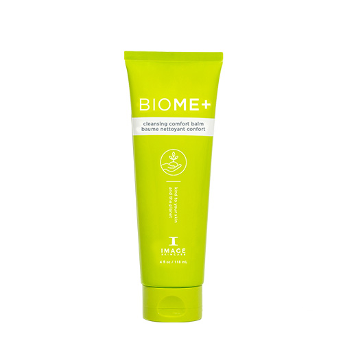 Een tube IMAGE Skincare BIOME+ Cleansing Comfort Balm, een voedende gezichtsreiniger met squalaan en plantaardige oliën op een lichtgrijze achtergrond.
