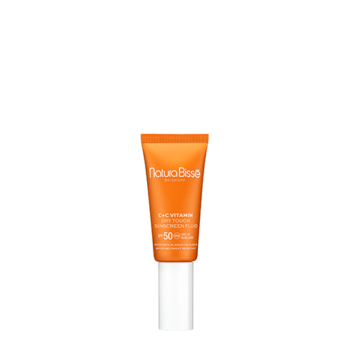 Vooraanzicht van de oranje Natura Bissé C+C Vitamin Dry Touch Sunscreen Fluid SPF 50 tube met witte dop op een witte achtergrond.