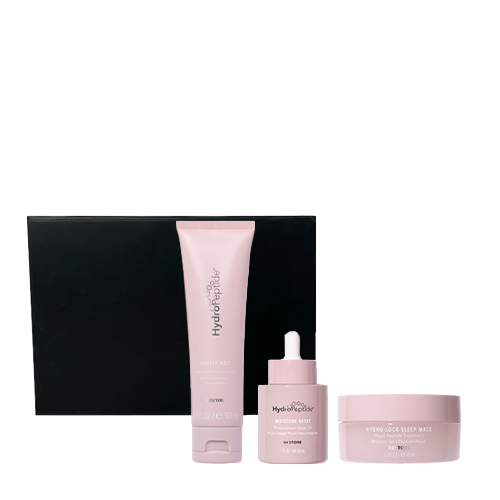 Overzicht van de HydroPeptide Care With Love set met de Makeup Melt, Moisture Reset olie en Hydro Lock Sleep Mask voor een zwarte doos.