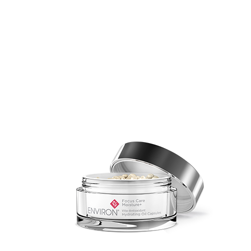 Productfoto van een geopende pot Environ Focus Care Moisture+ Vita-Antioxidant Hydrating Oil Capsules gevuld met capsules