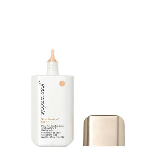 Flesje Jane Iredale Glow Fixation in de kleur Fair to Light met de gouden dop ernaast
