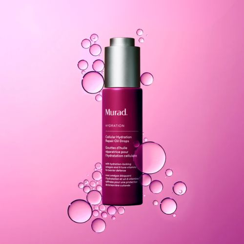 Paars flacon van Murad Cellular Hydration Repair Oil Drops omringd door druppels