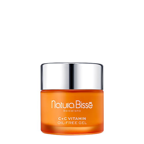 Een glazen oranje potje van Natura Bissé C+C Vitamin Oil-Free Gel met een zilveren dop tegen een witte achtergrond.