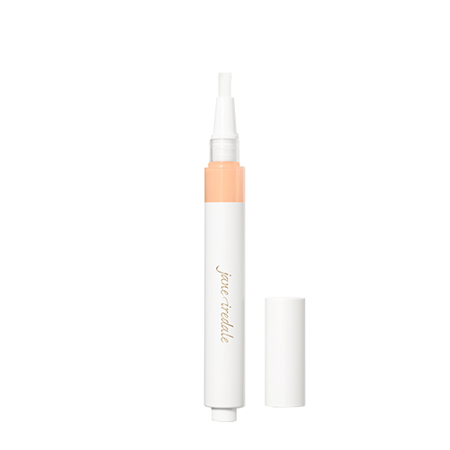 De LM4 variant van de Skintuition Brightening Under Eye Concealer met de dop ernaast en de penseeltip omhoog
