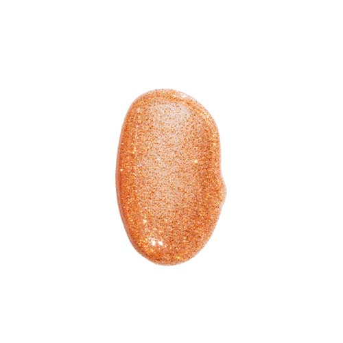 Swatch van de Nimya Spill The Juice lipgloss in de kleur Are You Sitting Down met een glinsterende warme bronzen textuur